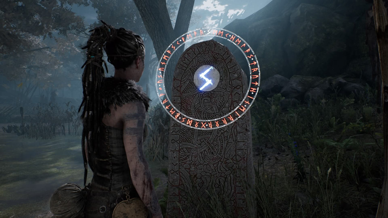 Hellblade: Senua's Sacrifice VR - Senua examining a stone with hieroglyphs