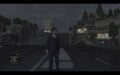 L.A. Noire Xbox One - Main character standing in the rain on a street