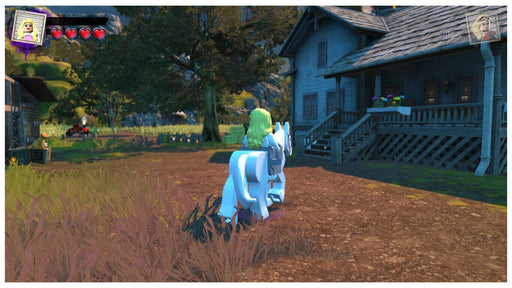 Screenshot from LEGO DC Super-Villains on PC Steam showing a LEGO character on horseback approaching a rural wooden house â play now with your Steam CD key from RushGame.co