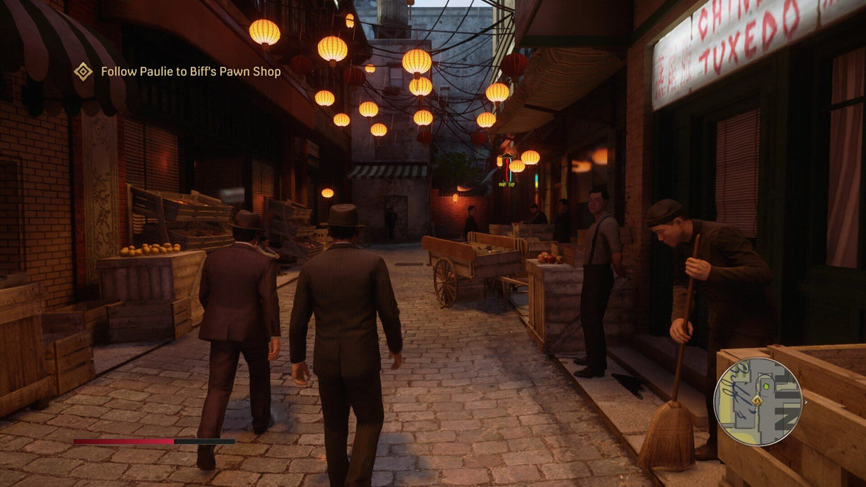 A dark and moody alleyway in Mafia Definitive Edition on xbox one, lit by glowing lanterns as the main characters walk through. Immerse yourself in this authentic 1930s world and grab your Xbox game key at RushGame.co