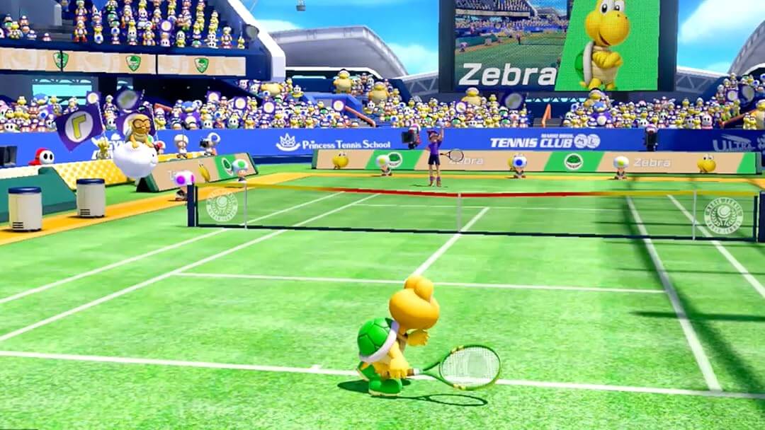 Koopa Troopa rallies on a grass court during an exciting tennis match in Mario Tennis Aces for Nintendo Switch. Get your game key and jump into the competition from RushGame.co