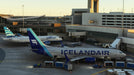 Microsoft Flight Simulator Xbox code gameplay showing detailed Icelandair and JetBlue planes at a terminal – Explore realistic airport environments with highly detailed aircraft models like Icelandair and JetBlue in Microsoft Flight Simulator key. Buy your Xbox game key now at RushGame.co.