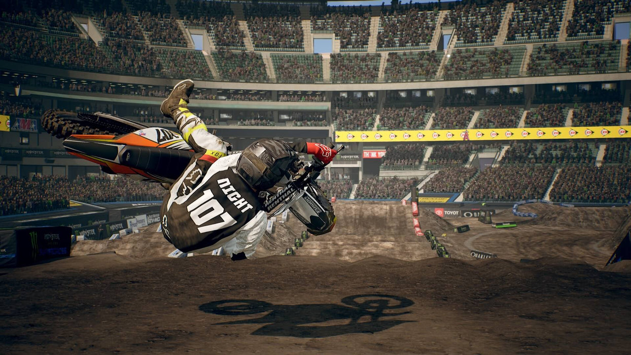 A motocross rider executing a sideways flip during a race in Monster Energy Supercross 3 Special Edition on Xbox. Unlock the full game at RushGame.co for the ultimate dirt racing experience