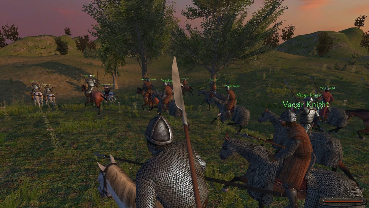 Mount & Blade PC Cavalry Battle Scene – A group of mounted knights prepare for battle in the rolling hills of Mount & Blade, featuring an epic cavalry charge. Get your Mount & Blade Collection game key for PC Steam from RushGame.co