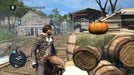 Shay Patrick Cormac surveys a bustling colonial settlement, standing near barrels and a pumpkin in Assassin's Creed Rogue Remastered for Xbox One. Purchase your game key instantly at RushGame.co