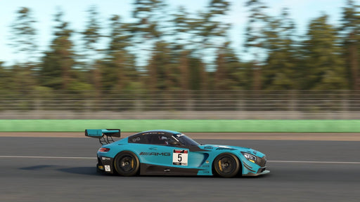 A sleek blue AMG GT3 race car speeds along a professional circuit in Automobilista 2, highlighting realistic physics and motion blur. Buy your PC Steam key at RushGame.co and immerse yourself in the ultimate racing experience.