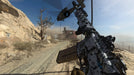 Game screenshot: A player reloads a customized assault rifle while capturing objectives in a desert multiplayer battlefield in Call of Duty: Modern Warfare. Get your Xbox One CD Key for COD: Modern Warfare at RushGame.co and dominate the battlefield with fast-paced FPS gameplay