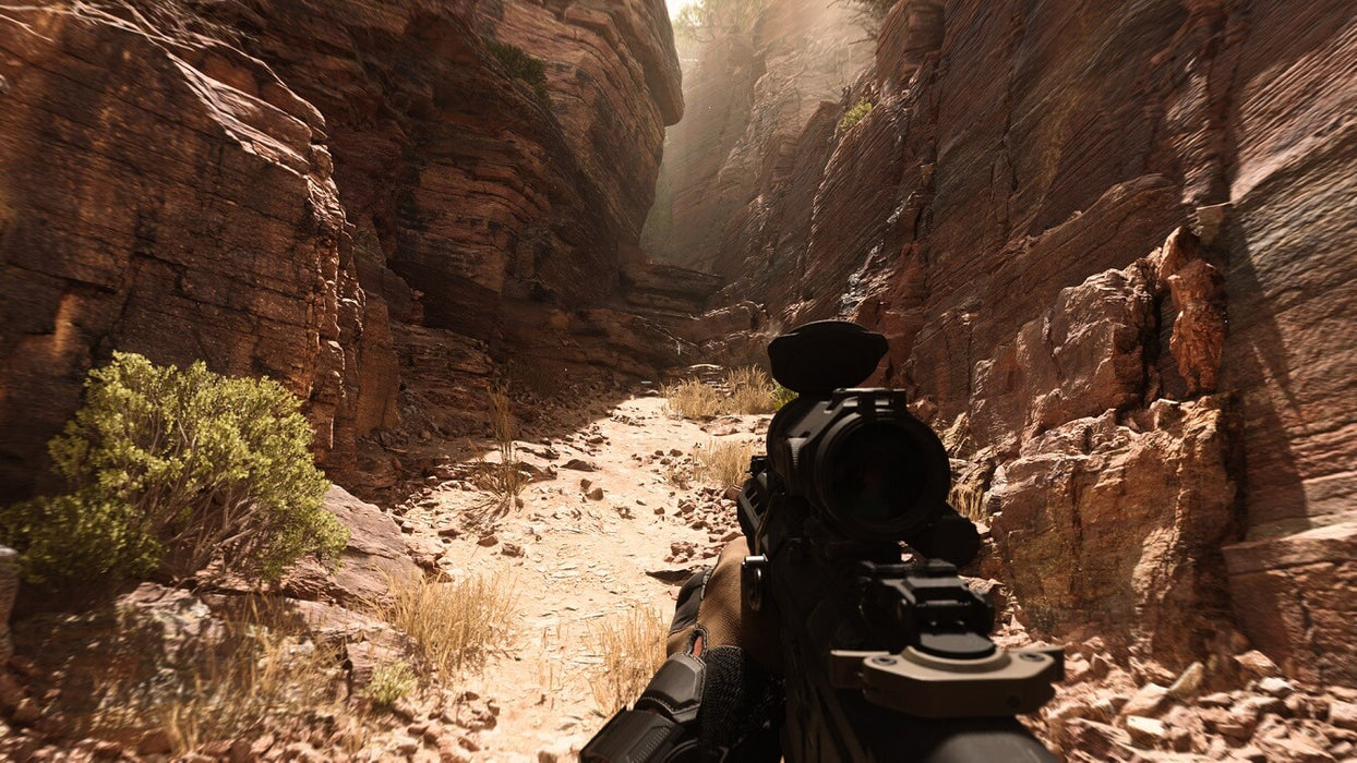 game screenshot: A rocky canyon ambush scene in Modern Warfare II (2022), featuring immersive first-person action. Buy your digital key now at RushGame.co.