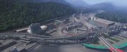 Gameplay screenshot: A highly detailed transportation hub in Cities: Skylines - Industries DLC, featuring an intricate highway interchange surrounded by a lush green landscape. Expand your city-building experience with a Cities: Skylines DLC Steam CD Key from RushGame.co