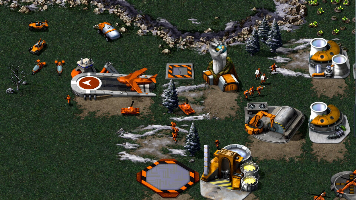 Command & Conquer Remastered Collection gameplay – GDI base – A top-down strategic view of a GDI base with upgraded remastered graphics, featuring production buildings, tanks, and infantry preparing for battle. Experience the revamped classic strategy game by purchasing your digital activation key at RushGame.co