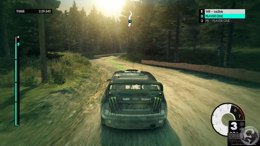 gameplay screen - A Ford rally car speeds through a dense forest track in DiRT 3 Complete Edition, with a dynamic lighting effect casting shadows from the trees. The HUD displays current race status, with a green racing line guiding the way. Experience high-speed rally racing with a Steam key from RushGame.co