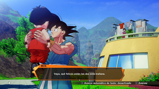 Gameplay screenshot - Goku holding his young son Gohan in a touching moment outside their home, with lush green mountains in the background. Experience the iconic story of DBZ in DRAGON BALL Z: Kakarot Legendary Edition, available at RushGame.co