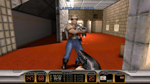 screenshot – Duke Nukem in a restroom fight): Classic FPS combat in Duke Nukem 3D: 20th Anniversary World Tour on PC Steam, featuring a close-quarters battle inside a restroom, with the player aiming a shotgun at a pixelated enemy. Experience the retro shooting action—buy your game key at RushGame.co