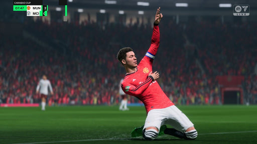 In-game screenshot from EA SPORTS FC 24 on PC Steam, showcasing a Manchester United player in a red jersey celebrating a goal during a Carabao Cup match. The scoreboard indicates a 2-0 lead over Manchester City. Experience the excitement of football by purchasing an EA SPORTS FC 24 CD Key at RushGame.co with instant delivery