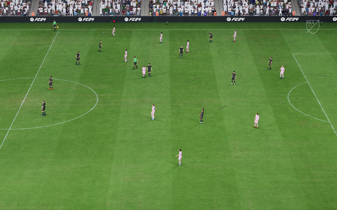 Gameplay screenshot from EA Sports FC 24 on Xbox, showcasing a realistic match on a fully packed stadium. Experience next-gen football simulation with enhanced graphics and AI. Get your digital game key now at RushGame.co