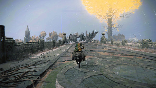 Gameplay Screenshot - A warrior on horseback charges across a ruined stone bridge in Elden Ring: Shadow of the Erdtree DLC on Steam, heading toward the skeletal remains of a massive fallen creature, with the golden Erdtree glowing in the distance. Get your activation key now at RushGame.co