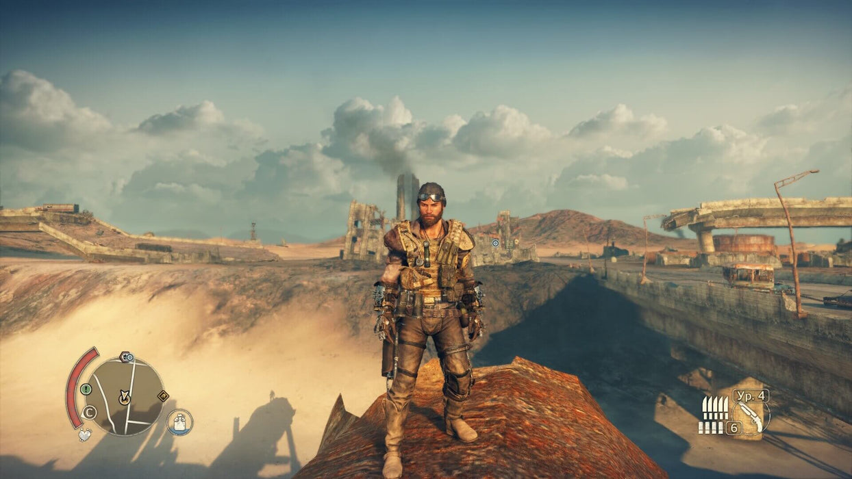 Max stands on a scrap metal hill overlooking the wasteland in Mad Max Xbox One Key, ready for battle in a world of chaos. Purchase your Mad Max game code on RushGame.co for instant delivery