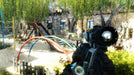 Scene from Metro Last Light Redux, showing an abandoned playground with a visible slide and the player aiming through the rifle scope. Game available for PC Steam at RushGame.co