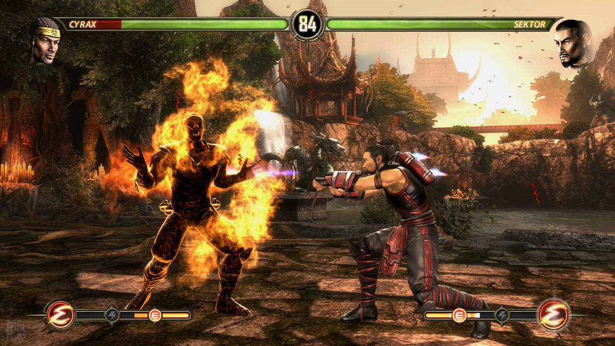 Intense battle between Cyrax and Sektor as flames engulf the arena in Mortal Kombat Komplete Edition. Secure your digital download on RushGame.co for the best fighting experience on Steam