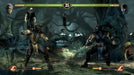 Mortal Kombat Komplete Edition steam code gameplay showing a fierce battle between Scorpion and Sub-Zero in a dark forest arena. Buy your game key now at RushGame.co and enter the ultimate combat experience