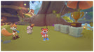 Gameplay image from New Super Lucky's Tale for Xbox One, with Lucky and companions standing beside a large golden trophy in a grassy area – get your Xbox CD key instantly from RushGame.co