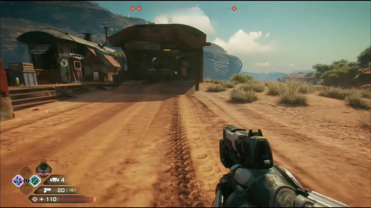 First-person gameplay from Rage 2: Deluxe Edition on Xbox One, showing a player approaching a desert outpost with pistol drawn. Get your official US CD key now at RushGame.co