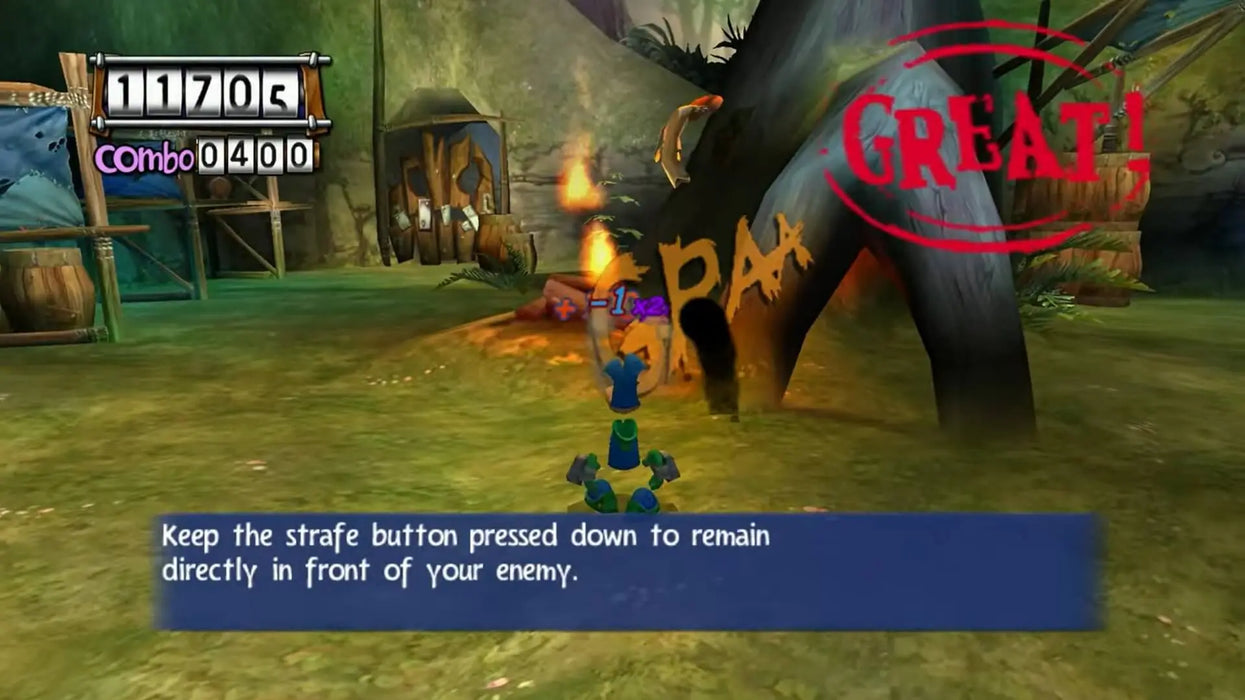 Gameplay image from Rayman 3: Hoodlum Havoc on PC, highlighting a combat scene with instructions on strafing. Get your GOG game key for Rayman 3 today at RushGame.co and master every move