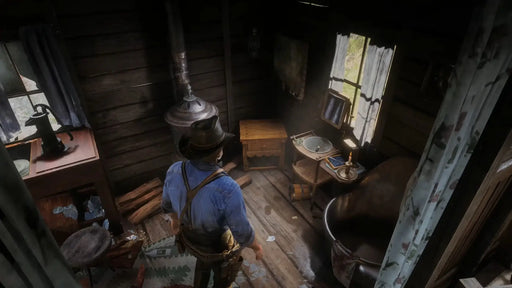 In-game screenshot from Red Dead Redemption 2 on Xbox showing the player inside a rustic wooden cabin with period-accurate furniture and lighting. Explore the immersive world of the Old West with a digital key from RushGame.co.