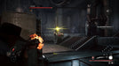 Intense firefight in Remnant: From the Ashes where the player targets an enemy named Shade using a flaming weapon inside a high-tech facility. Purchase your Steam CD Key for Remnant: From the Ashes today at RushGame.co