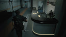 Gameplay screenshot from Resident Evil 2 Deluxe Edition showing Leon S. Kennedy exploring the Umbrella Corporation lab reception area. Buy Resident Evil 2 PC Steam CD Key at RushGame.co for an unforgettable survival horror experience