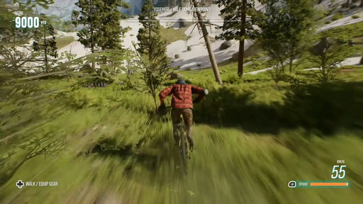 Dynamic gameplay from Riders Republic Complete Edition on PC, capturing a high-speed mountain bike descent through lush forests near Yosemite's Half Dome viewpoint. Available at RushGame.co