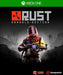 Cover art for RUST Console Edition Xbox One & Xbox Series X/S Key, featuring a heavily armed survivor in a post-apocalyptic landscape. Get your RUST Console Edition digital download at RushGame.co for safe, fast, and affordable activation on Xbox platforms