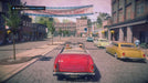 In-game screenshot from Saints Row IV: Re-Elected on Xbox One, showing the player driving a classic red convertible down Main Street in a vibrant American town, with a banner that reads "Our President is a Saint." Buy your digital game key instantly at RushGame.co.
