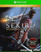 Cover art for Sekiro: Shadows Die Twice Game of the Year Edition for Xbox One, featuring the legendary shinobi in a dynamic pose with his katana. Buy your Sekiro Xbox key at RushGame.co and experience award-winning samurai action—instant digital code delivery.