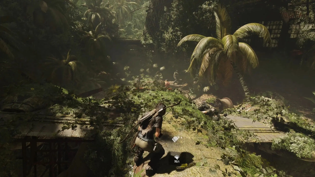 Stealth action scene with Lara Croft hiding in the lush jungle, preparing for combat in Shadow of the Tomb Raider Definitive Edition for Xbox One. Get your digital game key and join the adventure at RushGame.co