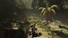 Stealth action scene with Lara Croft hiding in the lush jungle, preparing for combat in Shadow of the Tomb Raider Definitive Edition for Xbox One. Get your digital game key and join the adventure at RushGame.co