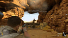 Gameplay screenshot from Sniper Elite 3 Steam Key + Season Pass, depicting a tense canyon shootout with the player aiming at an enemy soldier. Instantly unlock this tactical shooter on Steam with a digital code from RushGame.co and experience intense sniping missions
