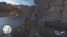 Gameplay screenshot from Sniper Elite 4 on Steam, featuring a stealth approach near a rocky coastal base. Purchase Sniper Elite 4 Steam codes safely at RushGame.co