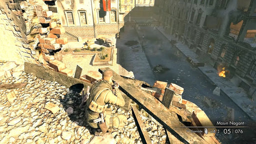 Screenshot from Sniper Elite V2 Remastered on Steam, showing a lone sniper advancing through a ruined city street—perfect for fans looking to purchase a Steam game code at RushGame.co and immerse themselves in tactical combat
