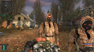 Scene from S.T.A.L.K.E.R.: Call of Pripyat, showing a group of NPCs in a ruined village environment. Explore and buy official S.T.A.L.K.E.R. Bundle Steam keys at RushGame.co